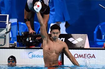 1438874677851_483143848-chinas-ning-zetao-celebrates-after-winning-gettyimages.jpg